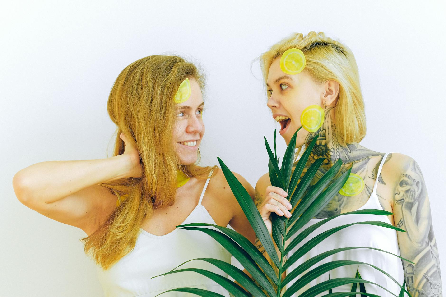 A young couple standing together indoors, exploring intimacy with a vibrator as a shared tool for connection